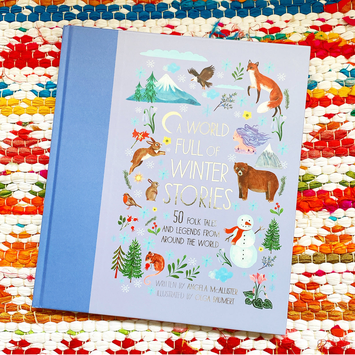 A World Full of Winter Stories 50 Folk Tales and Legends from Around the World | Angela McAllister (Author) + Olga Baumert (Illustrated by)