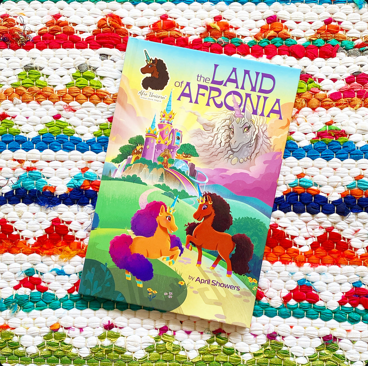 Afro Unicorn: The Land of Afronia, Vol. 1: Volume 1 (Afro Unicorn) | April Showers