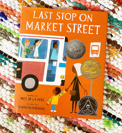 Last Stop on Market Street | Matt de la Peña (Author) + Christian Robinson (Illustrated by)